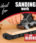 Hands using heavy duty woodworking project blocks for hands free routing sanding drilling on a wooden workpiece.