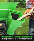 Person using 3 In 1 Wood Chipper Shredder Mulcher MF30 Heavy Duty Gas Powered 7HP 212cc With 3 Inch Capacity For Wood Leaves And Limbs