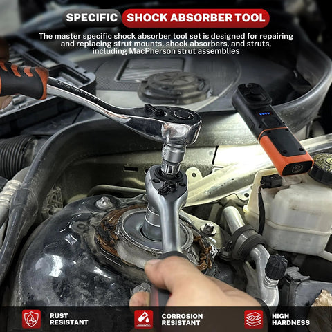 BILITOOLS shock absorber nut socket set installed on car strut top mount; ratchet and adapters visible.