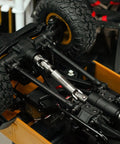Stainless Steel Center Drive Shafts For FCX24M Defender 1/24 RC Crawler Upgrade visible under chassis, showing tight connections.