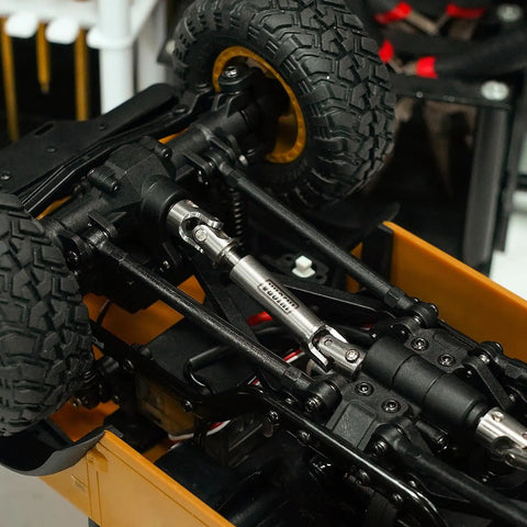 Stainless Steel Center Drive Shafts For FCX24M Defender 1/24 RC Crawler Upgrade visible under chassis, showing tight connections.