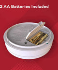 Two In One Smoke And Carbon Monoxide Detector With AA Battery Power And LED Warning Indicators Plus Home Fire Extinguisher With Mounting Bracket Included For Easy Safety Upgrades, showing open battery compartment with AA batteries.