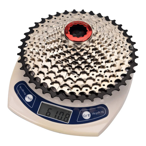 11 Speed Bike Cassette 11-40T Wide Range Sprocket For Shimano SRAM Sunrace HG Systems, Fits Mountain And Road Bikes, Rugged Steel Build For Smooth Shifts And Killer Value., 11-speed steel cassette on scale