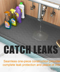 Under Sink Mat 34 By 22 Inches No Fuss Extra Thick 3mm Silicone Leakproof Kitchen Cabinet Protector and Liner with bottles