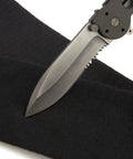 Hardcore Cut Resistant Arm Sleeves Built Tough With Real Dupont Kevlar Fiber For Serious Shop And Mat Drills heavy duty with knife close up.