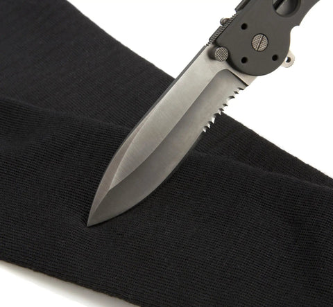 Hardcore Cut Resistant Arm Sleeves Built Tough With Real Dupont Kevlar Fiber For Serious Shop And Mat Drills heavy duty with knife close up.