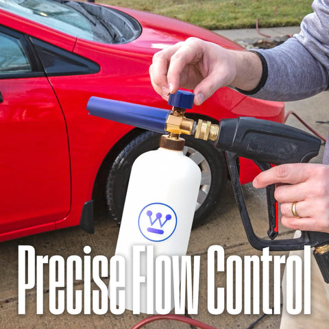 Pro Foam Cannon For Pressure Washers With 3600 Max PSI 1/4 Inch Connector attached to a pressure washer spraying a red car.