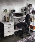 Rock Solid Adjustable Height Standing Computer Desk With Integrated Usb Charging Ports Sleek Metal Ladder Base Gaming Workstation in modern home office setup.