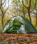 One Person Ultralight Backpacking Tent waterproof double layer in forest with green exterior and aluminum poles for camping