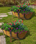 Two Pack Rustic Barrel Planters With Legged Design For Outdoor Garden Backyard Metal Half Barrel Flower Pot Planter Box Brown 15.43 Inch Long Each With Ample Planting Space Durable Anti Rust Coated Iron displayed in a garden.