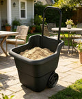 Heavy Duty 15 Gallon Rolling Garden Cart With Retractable Handle And 7 Inch Wheels For Outdoor Yard Work A Real Workhorse Lightweight Resin Utility Wagon filled with sand on patio