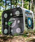 Rugged Four Sided Crossbow Block Target With Carry Handle For High Speed Arrows tough foam archery target in forest setting.