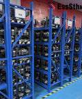 EssSthmy All-Metal Mini Wood Lathe 60W 12,000 RPM Bench Milling Machine parts displayed on blue racks in a workshop.