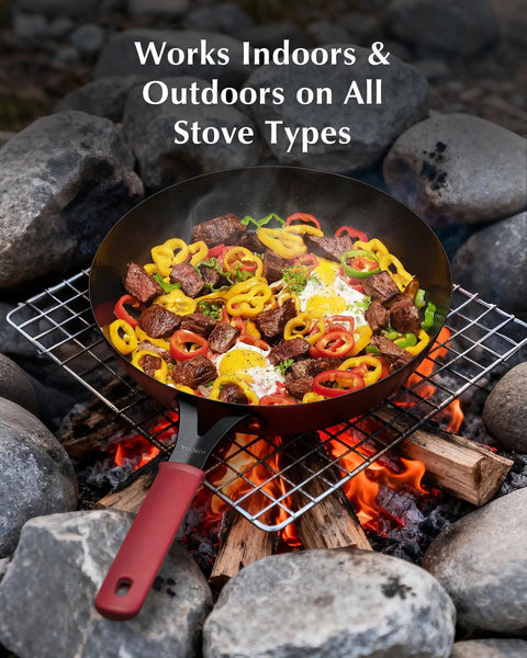Preseasoned Carbon Steel Frying Pan 10 Inch Skillet With Removable Silicone Handle, Built to Last, Indoor Outdoor Ready, Induction and Oven Safe, Fast Heating, Natural Nonstick Finish That Only Gets Better With Each Use, cooking over campfire with colorful veggies and meat