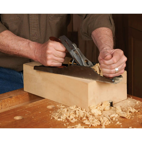 Using the Five Bench Hand Plane Jack Model V3 Built Tough With Heavy Cast Iron on a wooden block for smooth milling.