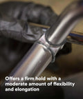 Close-up of DP190 Gray Epoxy Adhesive Duo-Pak 48.5 mL bonding metal pipes showcasing high shear and peel strength for construction.