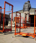 Heavy Duty Electric Lift Cart Built Tough For Heavy Lifting Delivers 1100 Pound Capacity solid steel platform in use outdoors.