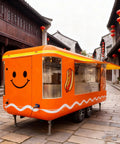 Kickstart Your Street Food Hustle With This Commercial Grade Mobile Food Truck Trailer equipped with windows and orange finish.