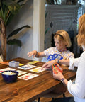 Continent Race Geography Board Game For Kid Friendly Families And Friends Learn Flags And Countries From Around The World With Fun Brain Boosts Game Night Ready For Classrooms And Home played by children and adult at table