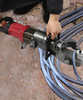 This 1150W Hydraulic Electric Rebar Bender Is A Total Game Changer For Construction Sites, used for bending steel rods on site.