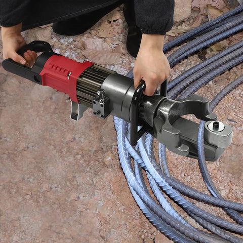 This 1150W Hydraulic Electric Rebar Bender Is A Total Game Changer For Construction Sites, used for bending steel rods on site.