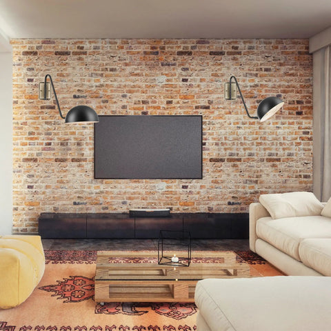 Addison 1 Light Plug In Wall Sconce In Matte Black With Antique Brass Accents Mid Century Modern Style on brick wall in living room