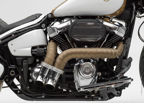 Motorcycle exhaust with Titanium Exhaust Heat Wrap With Lava Rock Technology 2 In By 25 Ft Pliable Tape, visible on pipes