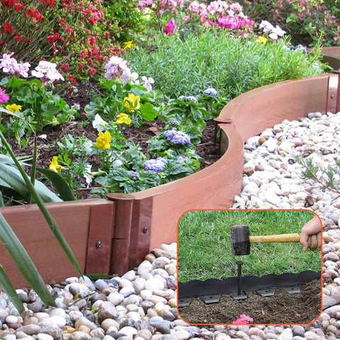 Using Heavy Duty 8 Inch Landscape Edging Stakes Set Of 60 For Paver Edging And Weed Barrier in a garden setting with spiral spike design.