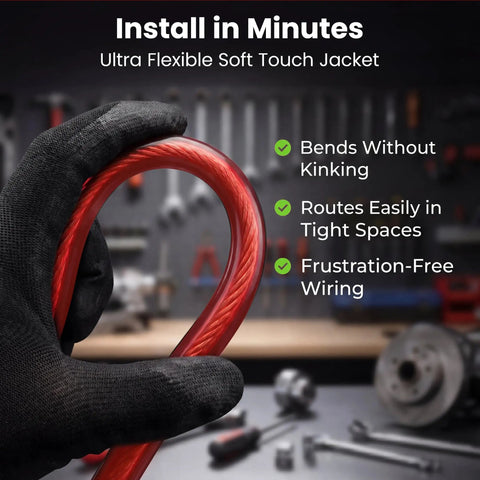 0 Gauge Car Audio Wiring Kit 3-In-1 With 1/0 AWG CCA Power And Ground Cable, 25 Ft Each In Black And Red, shown flexible in hand.