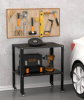 Beefy Steel Welding Workbench Cart With Wheels 32 By 20 Inch Metal Table in garage next to car with tools and storage
