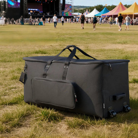 No Sweat Electronic Drum Roller Case With Thick Cushioning And Easy Rollin Wheels, Large Travel Softcase with wheels in a grass field.