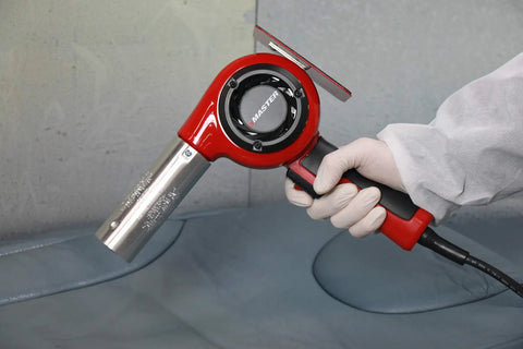 Pro Grade Industrial Heat Gun With High Airflow And Quick Change Plug In Heating Element for 1200F 120V 1740W shown in use