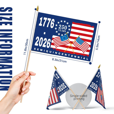 Person holding 12 Pack 250th Anniversary Flags 5x8 Inches Handheld Polyester Double Sided With Wooden Poles For Easy Assembly