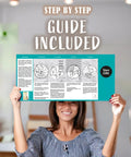 Person holding step-by-step guide for Starburst Geometric Wall Stencil Kit 2 Pack Of 16.5 X 31.5 Inch Stencils For Large Pattern Scandinavian Style DIY Wall Art Easy Paint Application Budget Friendly Dope Wallpaper Alternative Includes Step By Step Instructions And Video Tutorials.