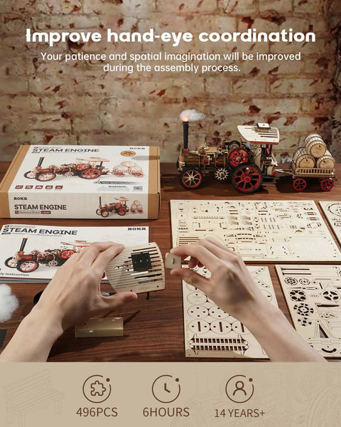 Hands assembling electric vintage steam engine 3D puzzle kit for adults 469 piece mechanical wooden model car DIY hobby.