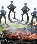 Funny Man Shaped Hot Dog Holder For Grilling Hands Free Stainless Steel Sausage Stand on a BBQ grill with sausages
