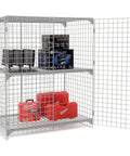 Rock Solid Wire Mesh Security Locker Featuring Two Roomy Doors And A Freely Adjustable Center Shelf Built Tough For Garages Warehouses Or Workshops In Clean Gray with tools and equipment inside.