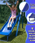 Child sliding down Arcadia Metal Swing Set For Kids With Trapeze And Two Person Glider, Five Foot Wave Slide in outdoor backyard