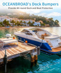 Rig Ready Ultra Heavy Hitter 17 Inch Horizontal Dock Fenders Marine Grade Inflatable Bumpers on a wooden dock by a boat.