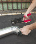 One-Handed Swivel Rivet Tool For Metal Fabric Leather And Auto Repair Manual Riveter in use with metal pipe, close-up