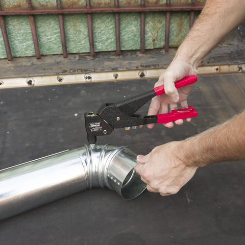 One-Handed Swivel Rivet Tool For Metal Fabric Leather And Auto Repair Manual Riveter in use with metal pipe, close-up