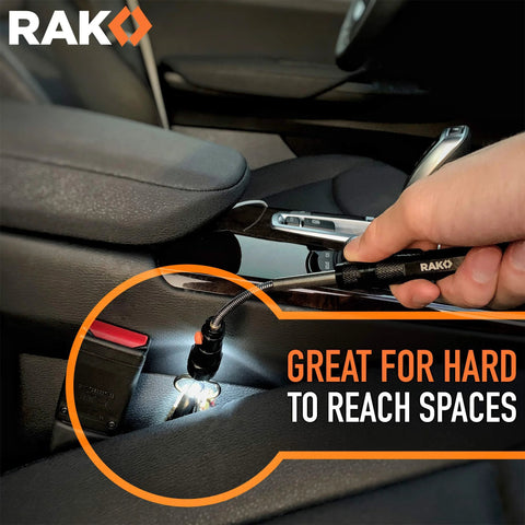 Using LED magnetic pickup tool in car for hard-to-reach spaces