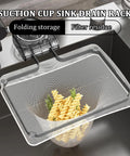 No Fuss Kitchen Sink Strainer With Heavy Duty Filter Mesh Bag And Grip Tight Suction Cup Quick Fold Design For Washing Produce And Catching Scraps Major Kitchen Upgrade, pasta in grey mesh basket.