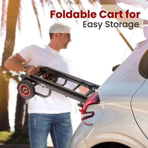 Man placing Compact Folding Equipment Dolly Converts Into 8 Handy Carts into car trunk for easy storage