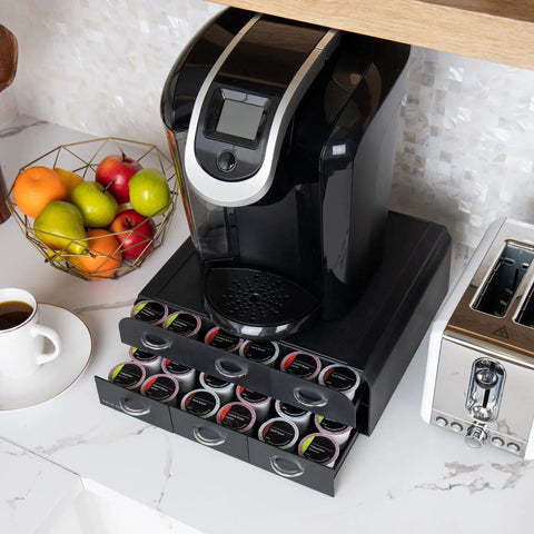 72 Pod Coffee Drawer Organizer With Two Tier Storage For Single Serve Pods Countertop Base to Support Most Coffee Machines and Keep Pods Neatly Sorted in Twelve Rows Black with open drawers and various pods