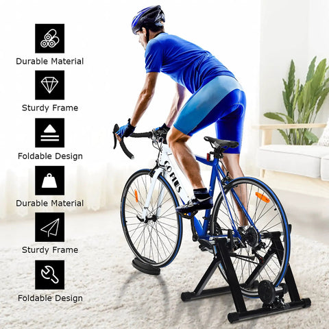Cyclist using Indoor Bike Trainer Stand With 8 Levels Of Resistance Portable Steel Cycling Trainer For 26 To 28 Inch Mountain And Road Bikes.