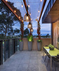 Battery Powered Hanging Pendant Light Outdoor Waterproof Chandelier With 6 Hour Timer illuminating a modern patio