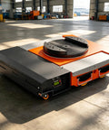Smooth Operator Heavy Duty Electric Transfer Cart With Remote Control, trackless turntable viewed from the side in a warehouse.