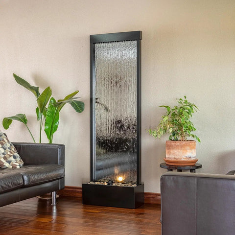 Mirror Waterfall Fountain With Stones And Lights For Indoor Outdoor Zen Decor Create A Calming Vibe In Your Living Room Office Patio Or Entryway 72 Inches Tall, shown in a modern living room setting with plants and seating.