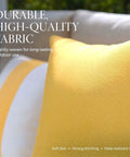 Close-up of yellow outdoor pillow covers set of 2 18x18 waterproof throw pillow covers for porch and patio furniture decor